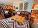 Inviting living room showcasing hardwood floors, stylish decor, and comfortable seating arrangement at 360 Morgan Mill Rd, Brooks, GA 30205