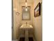 Stylish powder room with elegant pedestal sink and modern fixtures at 360 Morgan Mill Rd, Brooks, GA 30205