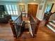 Staircase with wood treads and a safety gate, leading to the basement at 360 Morgan Mill Rd, Brooks, GA 30205