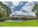Backyard with in-ground pool, deck and patio area perfect for outdoor gatherings at 245 Edenwylde Ct, Hampton, GA 30228