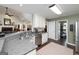 Spacious kitchen with granite countertops, stainless steel appliances, and convenient pantry access at 245 Edenwylde Ct, Hampton, GA 30228