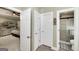 This is an inviting main bedroom and bathroom featuring stylish décor and an ensuite at 245 Edenwylde Ct, Hampton, GA 30228