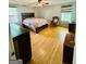 Spacious bedroom with ample natural light and hardwood floors, creating a cozy retreat at 35 Hampton Oaks Dr, Hampton, GA 30228