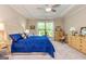 Bright and airy main bedroom with ample natural light, a tray ceiling, and neutral tones at 326 Elkins Place, Peachtree City, GA 30269