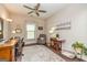 Bright office featuring hard wood floors, and traditional furnishings including an armchair and a desk at 326 Elkins Place, Peachtree City, GA 30269