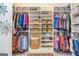 Organized walk-in closet with ample shelving, hanging space, and storage baskets at 326 Elkins Place, Peachtree City, GA 30269
