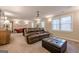 Finished basement with a large recreation area including a projector, leather seating, and foosball at 3502 Village Green Dr, Roswell, GA 30075