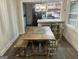 Cozy dining area with an open view into a modern kitchen, perfect for Gathering meals at 6178 Graceland Cir, Morrow, GA 30260