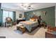 Stylish main bedroom featuring calming tones, a ceiling fan, and natural light at 3347 Sable Glen, Atlanta, GA 30349