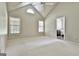 Bedroom boasting an ensuite bathroom and large windows for ample light at 128 Rubicon Rd, Peachtree City, GA 30269