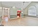 Spacious living room leading to the front entry and the kitchen area at 128 Rubicon Rd, Peachtree City, GA 30269