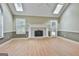 Spacious living room featuring skylights, vaulted ceilings, and a fireplace at 128 Rubicon Rd, Peachtree City, GA 30269
