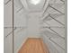 Spacious walk-in closet features wire shelving and wood-look floors at 128 Rubicon Rd, Peachtree City, GA 30269