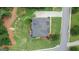 Aerial view of a well-maintained home with a landscaped yard and inviting outdoor spaces at 4830 Northridge Dr, Cumming, GA 30041