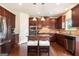 Well-equipped kitchen with granite countertops, stainless steel appliances, and a central island with seating at 4830 Northridge Dr, Cumming, GA 30041