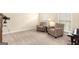 Cozy living room with plush carpet, a pair of chairs and two windows at 4830 Northridge Dr, Cumming, GA 30041