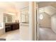 Luxury bathroom featuring a glass-enclosed shower, soaking tub, and walk-in closet at 4830 Northridge Dr, Cumming, GA 30041
