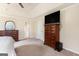 The spacious main bedroom provides ample room with its large dresser and seating area at 4830 Northridge Dr, Cumming, GA 30041