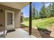 Cozy patio space offers a serene outdoor setting with lush greenery and stone accents at 4830 Northridge Dr, Cumming, GA 30041
