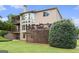 Stunning home exterior with multiple decks overlooking a lush backyard and mature trees at 4830 Northridge Dr, Cumming, GA 30041