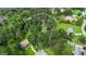 Aerial view of a property showing its boundaries and surrounding lush greenery at 115 Rockhurst Chase, Tyrone, GA 30290