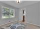 Bedroom with lots of natural light and view to another room in the house at 115 Rockhurst Chase, Tyrone, GA 30290