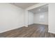 Bright and airy living room featuring wood-look floors, and an open layout at 235 Oliver Dr, Locust Grove, GA 30248