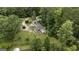 Aerial view of home featuring large lot with lush lawn and mature trees at 300 Peggy Cole Bridge Rd, Villa Rica, GA 30180