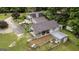 Aerial view featuring a charming house with covered porch, and mature trees at 300 Peggy Cole Bridge Rd, Villa Rica, GA 30180