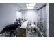 Bathroom with a skylight, modern vanity, decorative shower curtain, and updated fixtures at 300 Peggy Cole Bridge Rd, Villa Rica, GA 30180