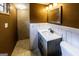 Bathroom with updated sink and modern vanity plus tiled shower at 300 Peggy Cole Bridge Rd, Villa Rica, GA 30180