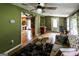 Open living area with views to the kitchen, wood floors, and a comfortable seating arrangement at 300 Peggy Cole Bridge Rd, Villa Rica, GA 30180