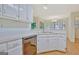 Well-equipped kitchen featuring a stainless steel dishwasher and ample cabinet space at 40 Riverside Pkwy, Sharpsburg, GA 30277
