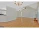 Spacious living room area with a chandelier and hardwood floors at 40 Riverside Pkwy, Sharpsburg, GA 30277