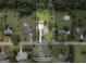 Beautiful aerial view of the home with lush greenery, offering privacy and serene setting at 312 Cattlemans Cir, Mcdonough, GA 30252