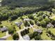Stunning aerial shot displaying the home's prime location amidst a vibrant, green neighborhood at 312 Cattlemans Cir, Mcdonough, GA 30252