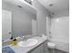 Well-lit bathroom features a standard vanity with a white sink and a toilet at 312 Cattlemans Cir, Mcdonough, GA 30252