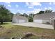 A detached two-car garage complements this house and features a long concrete driveway at 312 Cattlemans Cir, Mcdonough, GA 30252