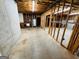 Unfinished basement featuring open ceilings, wooden framing, concrete walls, and potential for customization at 110 Chardonnay Oaks Dr, Mcdonough, GA 30252
