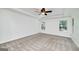 Spacious primary bedroom with tray ceiling, neutral carpet and a lot of natural light at 110 Chardonnay Oaks Dr, Mcdonough, GA 30252