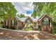 Charming brick home featuring a well-manicured lawn and inviting entrance perfect for a Gathering at 110 Chardonnay Oaks Dr, Mcdonough, GA 30252