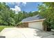 This home features an oversized driveway leading to a spacious 2-car garage at 110 Chardonnay Oaks Dr, Mcdonough, GA 30252