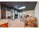 Spacious finished basement with neutral carpet, black ceiling, and open layout perfect for entertaining at 3212 Georgian Woods Cir, Decatur, GA 30034