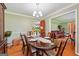 Dining room with a classic chandelier and table setting at 3212 Georgian Woods Cir, Decatur, GA 30034