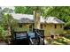 Backyard deck featuring a wooden deck, stairs, and natural views at 1624 Hampton Locust Grove Rd, Locust Grove, GA 30248