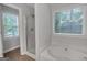 Bathroom featuring a stand-alone shower and tub at 105 Rosewood Cir, Covington, GA 30016