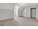 Bedroom featuring carpeted floors and built-in closet organizers at 105 Rosewood Cir, Covington, GA 30016