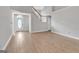 Bright living room featuring neutral colors, hardwood floors, and staircase at 105 Rosewood Cir, Covington, GA 30016