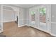 Bright dining room area with hardwood floors and patio access at 105 Rosewood Cir, Covington, GA 30016