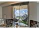 Balcony with a hanging chair and outdoor furniture offering stunning views of the city skyline at 285 Centennial Olympic Park Drive Northwest Nw Dr # 1905, Atlanta, GA 30339